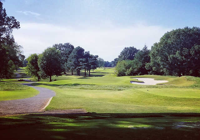 A sunny day view of a hole at Glen Eagle Golf Course.