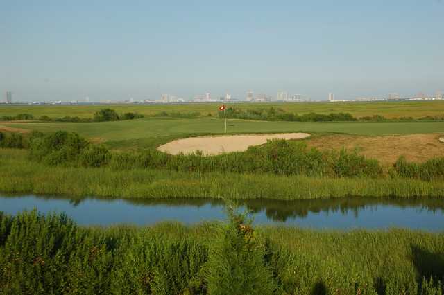 A view over the water of a green at Atlantic City Country Club.
