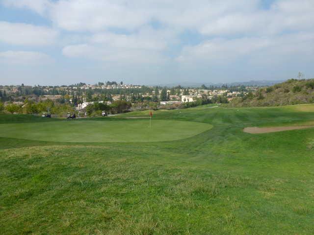 A sunny day view of a hole at Westridge Golf Club.