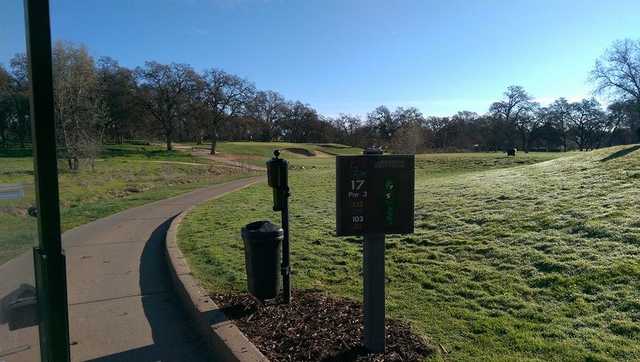 A view from tee #17 sign at Woodcreek Golf Club.