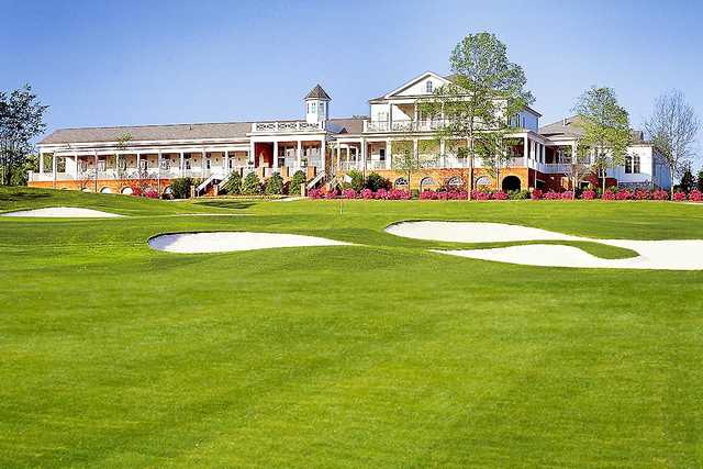 A view of a hole and the clubhouse at Georgia Club.