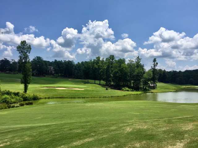 A sunny day view of a hole at Chestatee Golf Club.