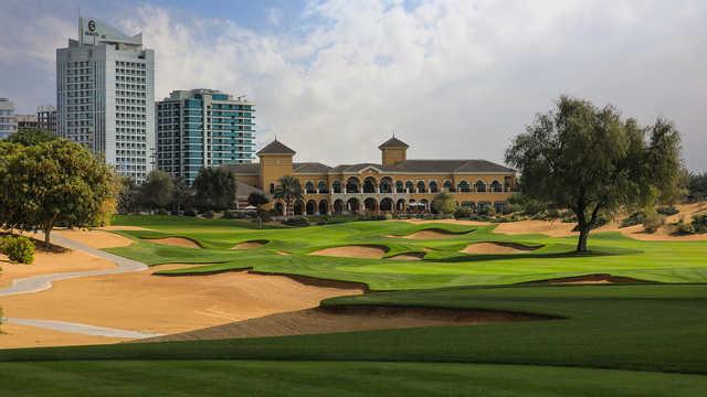 A view of a well protected hole and the clubhouse in background from The Els Club at Dubai Sports City.