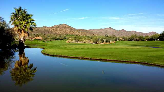 A view over the water of a green at Rancho Manana Golf Club.