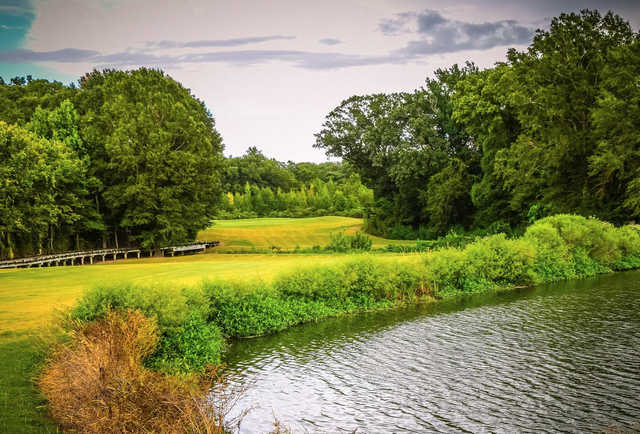 A view over the water of a hole at Black Bear Golf Course.