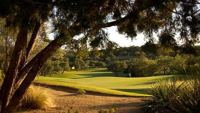 A sunny day view of a hole at Fazio Canyons Course from Omni Barton Creek Resort.