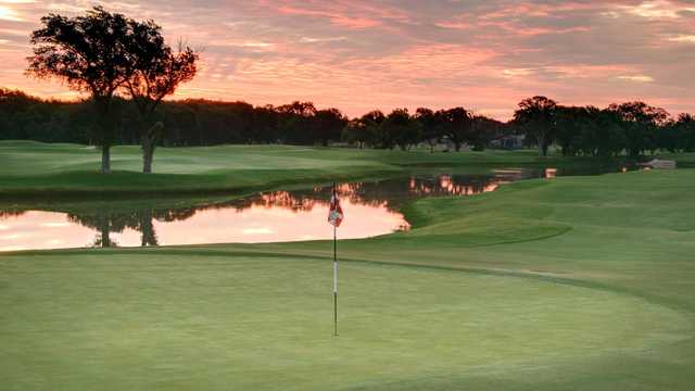 A sunset view of a hole at Sky Creek Ranch Golf Club.