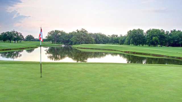A view of a green with water coming into play at Sky Creek Ranch Golf Club.