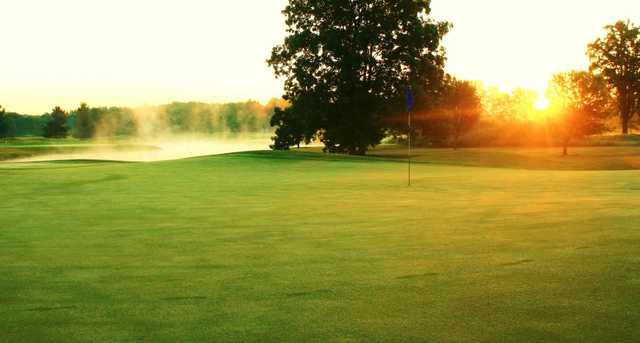 A sunrise view of a hole at Brookshire Inn & Golf Club.
