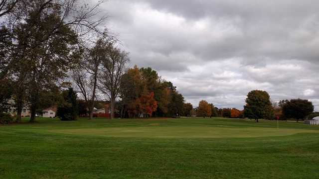 A fall day view of a hole at Indian Run Golf Course.