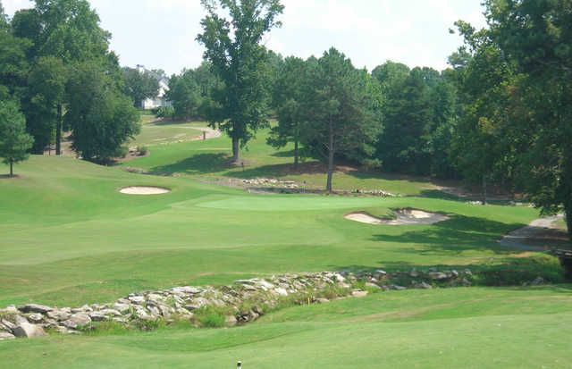 A sunny day view of a green at the Country Club of Gwinnett.