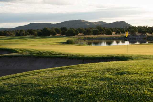 A sunny day view of a hole at Talking Rock Golf Club.