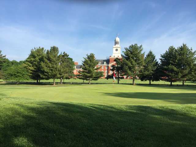 A sunny day view of a hole at Rutgers University Golf Course.