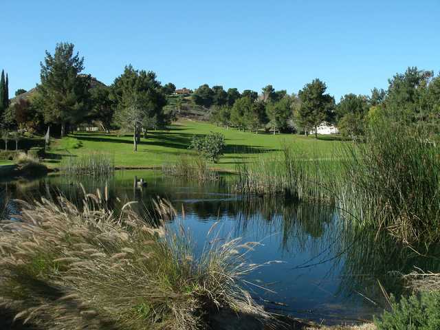 A view over a pond at Indian Hills Golf Club.