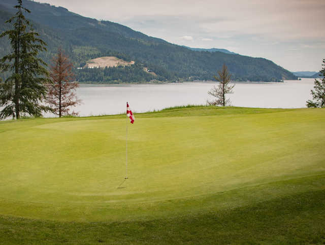 A view of a hole with water in background from MaraHills Golf Resort