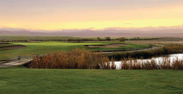 A sunset view of a green at Nanton Golf Club.