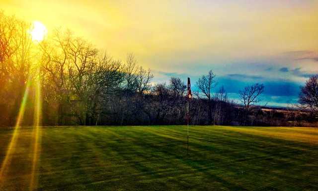 A sunset view of a hole at Neepawa Golf and Country Club.