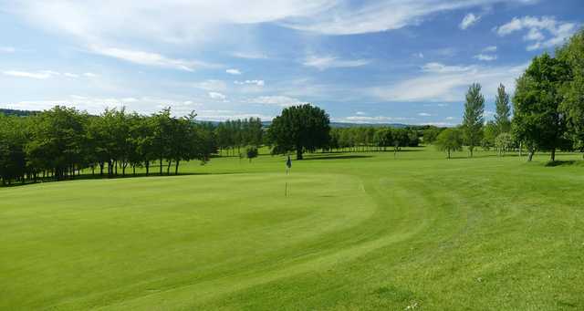 A sunny day view of a hole at Leominster Golf Club.