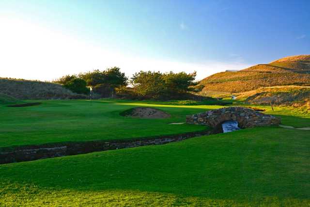 A sunny day view of a hole at Seascale Golf Club.