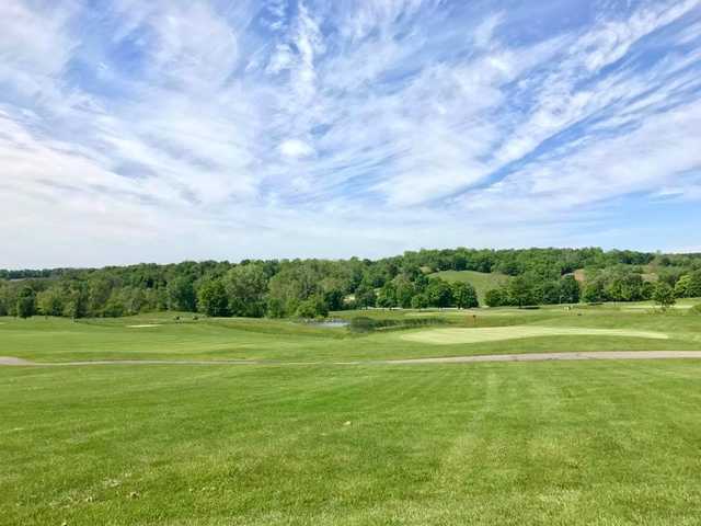 A view of a green with a pond in background from Links at Echo Springs.