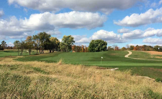 A fall day view of a hole at Majestic Springs Golf Course.